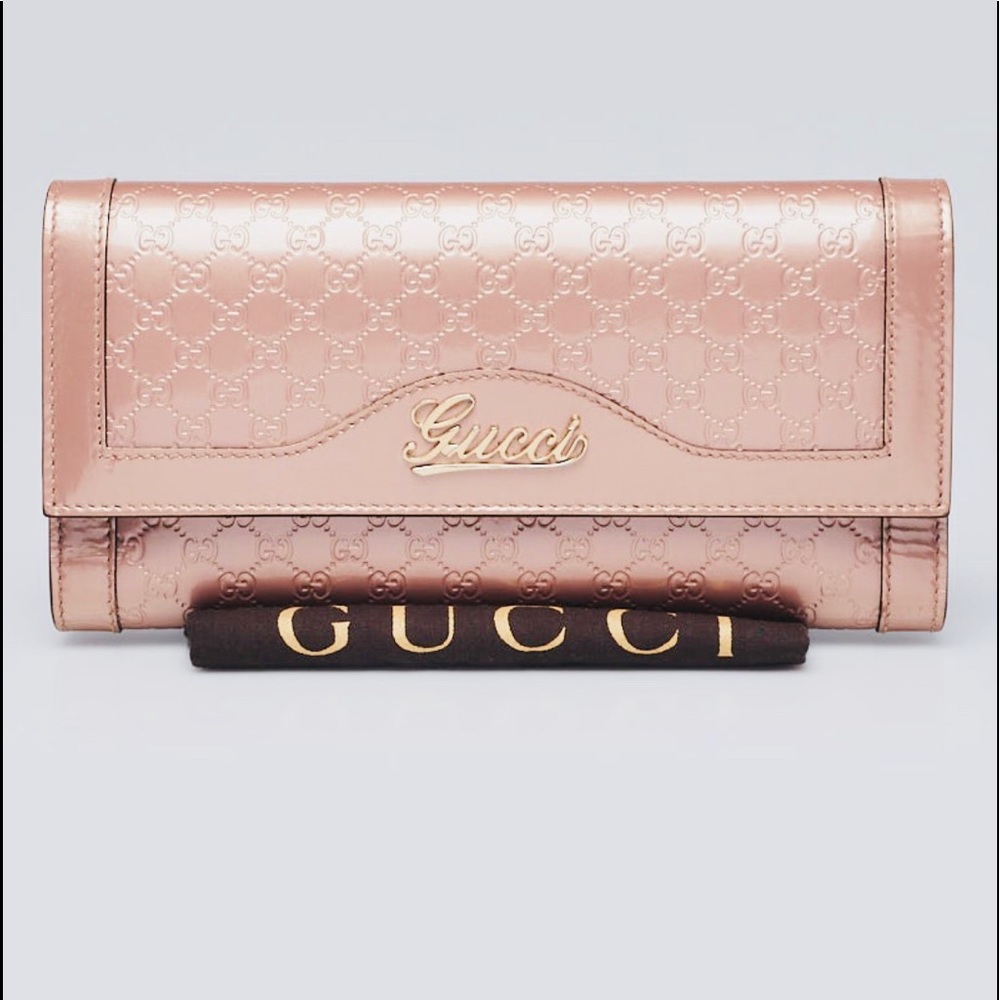 GUCCI
Pink Guccissima Embossed  Leather  Wallet